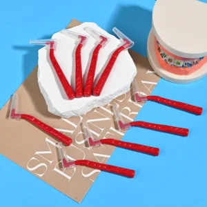 L-type interdental brushes with ergonomic angled handles in assorted colors, designed for professional oral care cleaning between teeth, ideal for B2B dental suppliers and OEM manufacturing.