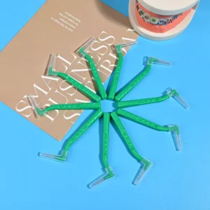 L-type interdental brushes with ergonomic angled handles in assorted colors, designed for professional oral care cleaning between teeth, ideal for B2B dental suppliers and OEM manufacturing.