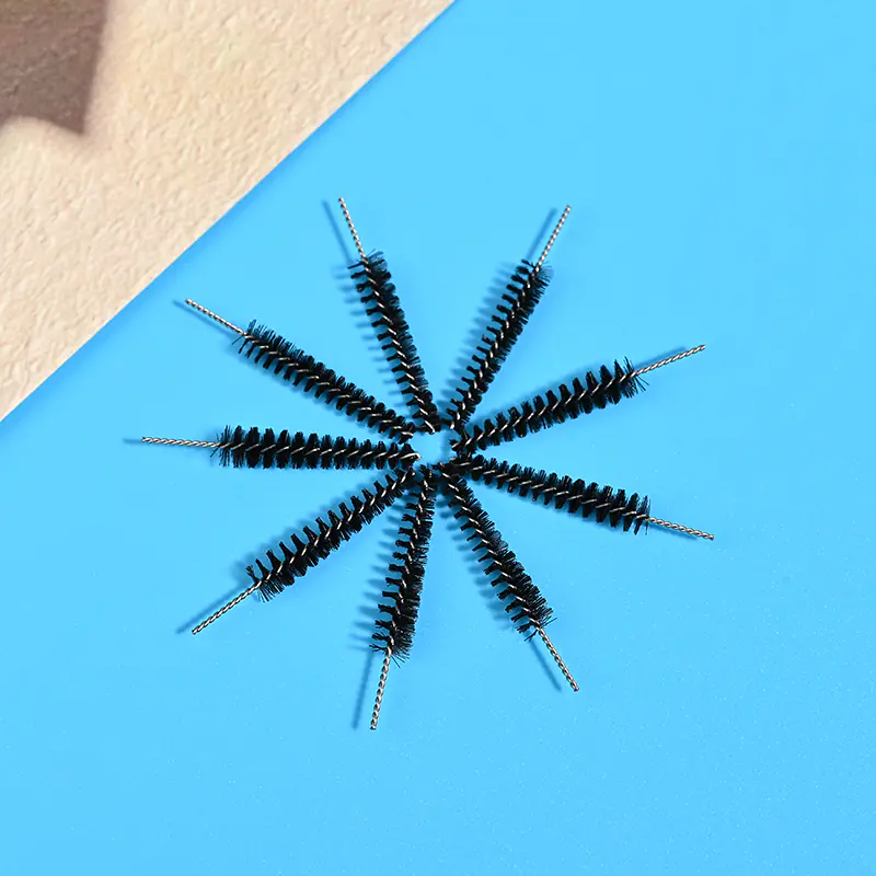 Cosmetic mascara brush heads with spiral bristles and twisted metal wire, suitable for eyelash mascara application, OEM manufacturing, bulk supply, and private label solutions for B2B beauty brands.