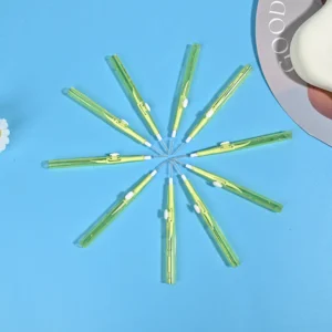 Push-pull type interdental brushes with yellow transparent handles, compact sliding design for easy storage and hygiene, suitable for dental care brands and B2B wholesale supply.