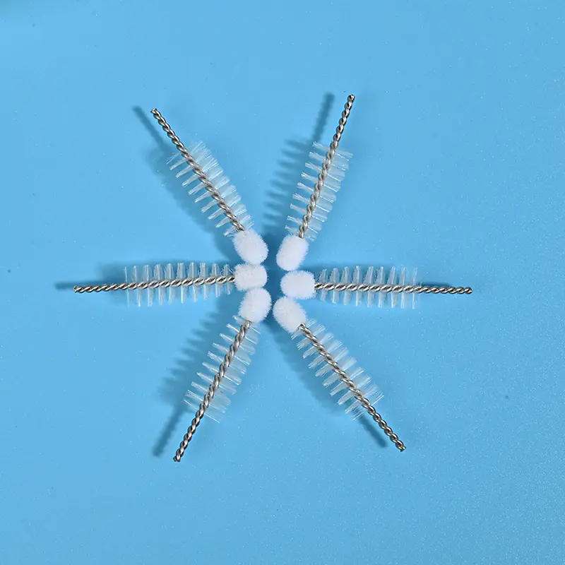 Mascara brush heads with twisted stainless steel wire and soft nylon bristles for cosmetic manufacturing