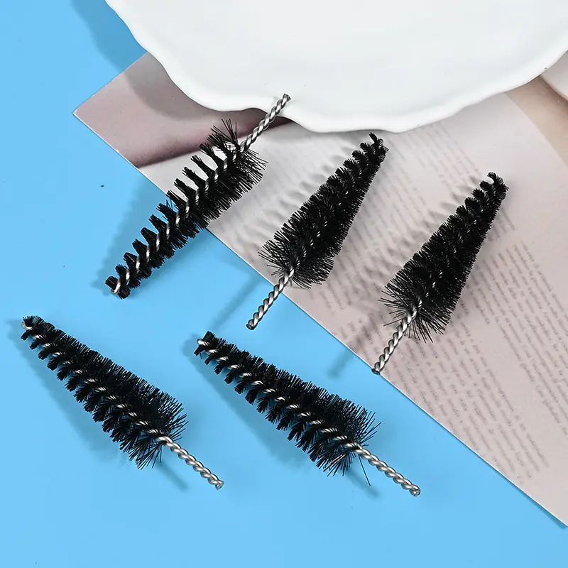 Medical device cleaning brush heads with black nylon bristles and stainless steel twisted wire core, designed for precise cleaning of medical instruments and narrow channels, B2B wholesale supply.