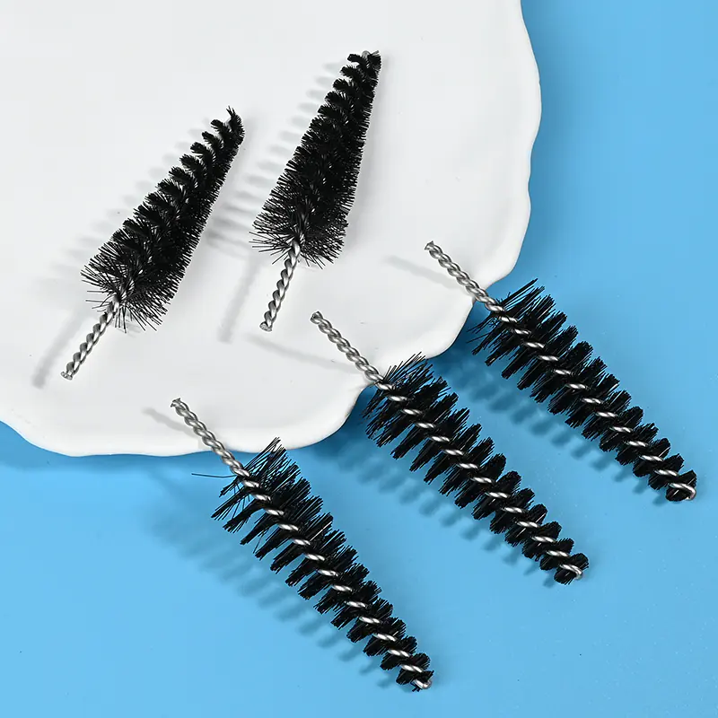 Medical device cleaning brush heads with black nylon bristles and stainless steel twisted wire core, designed for precise cleaning of medical instruments and narrow channels, B2B wholesale supply.