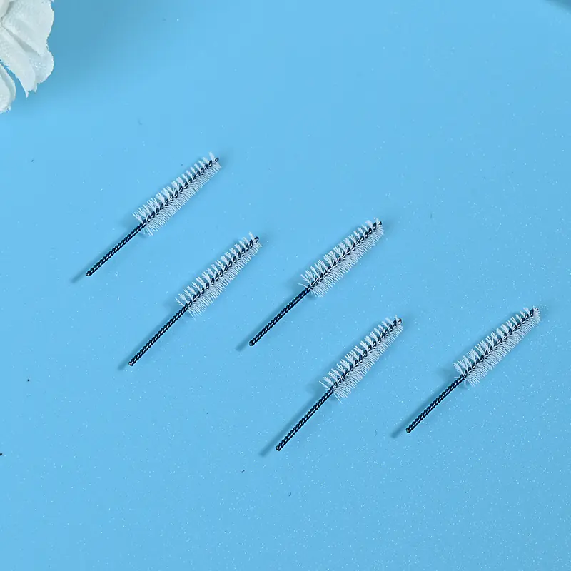 Blue coated wire interdental brush heads with nylon bristles for dental oral care, precision cleaning, and B2B wholesale supply