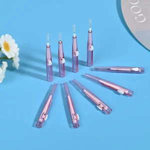 retractable pink interdental brushes shown in extended and closed positions