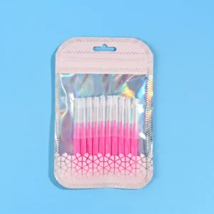 Pink retractable I-type interdental brushes packed inside holographic plastic retail pouch on solid bright blue background