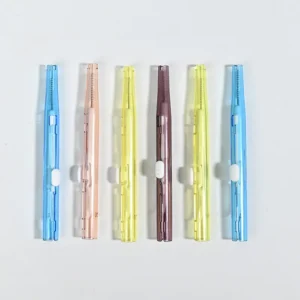 6 pcs transparent retractable interdental brushes flat lay shot on white background, colorful push-pull dental cleaner