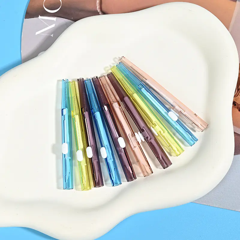 Multi-color transparent retractable interdental brushes placed on irregular white tray