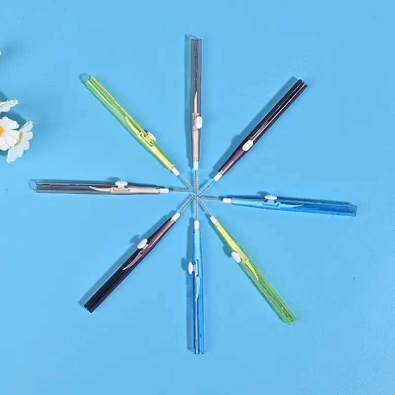 Radial arranged transparent retractable interdental brushes on light blue background
